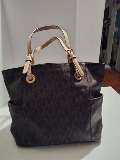 buy used michael kors handbags.